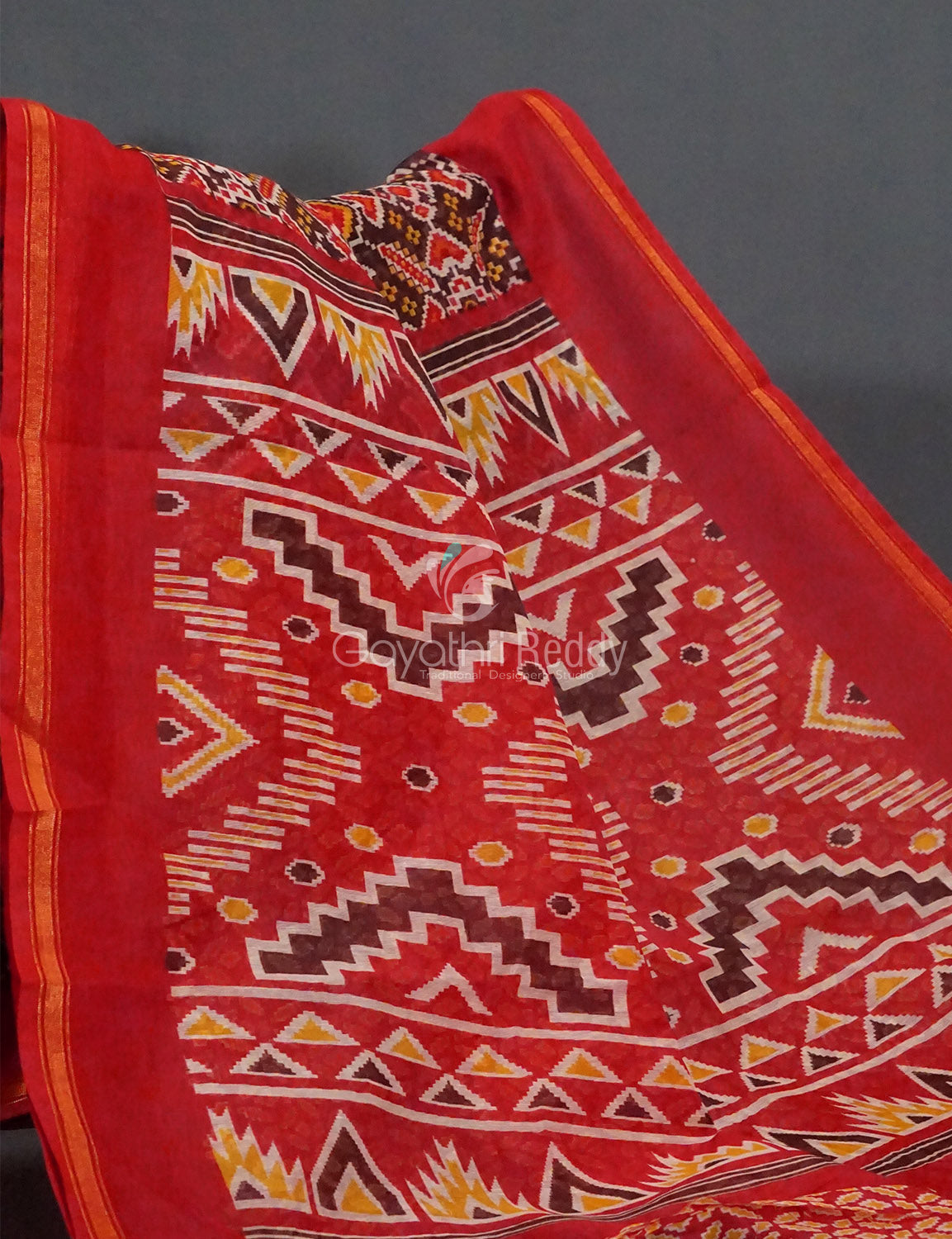 Brown And Red Coloured Patola Print Semi Chanderi Saree By Gayathri Reddy Designer Studio