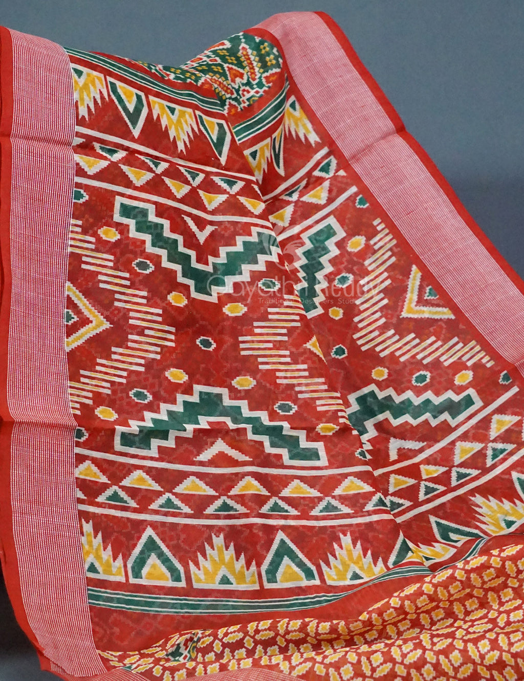 Shades of Navy Parrot Green Colour Patola Print Semi Chanderi Saree By Gayathri Reddy Designer Studio