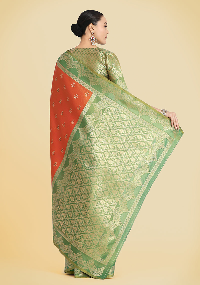 Monjolika Fashion Orange Color Weaving Banarasi Tissue Silk Classic Saree