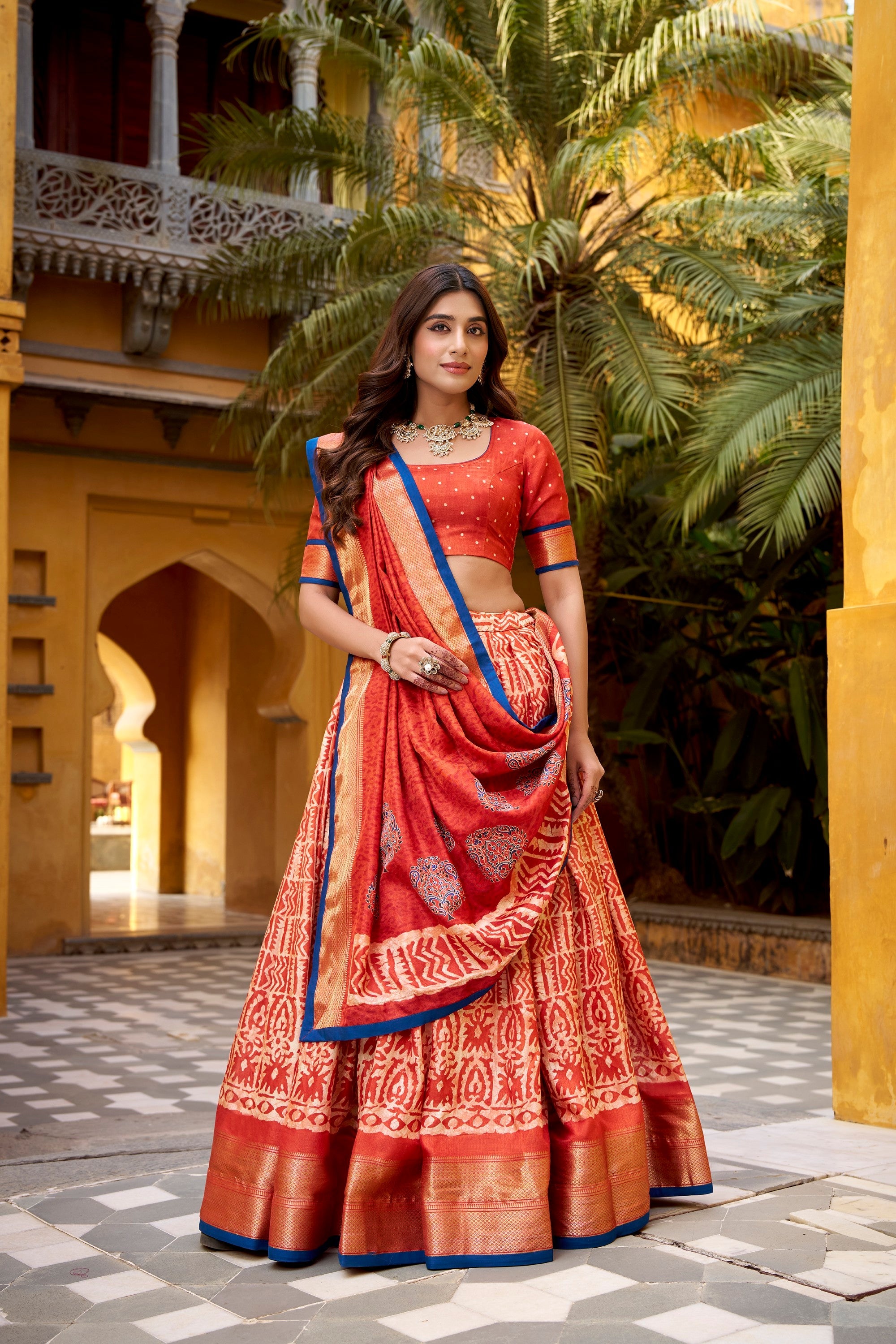Lorenvalley Fashion Rust Dola Silk Batik Print with Zari Weaving Work Lehenga Choli with Dupatta