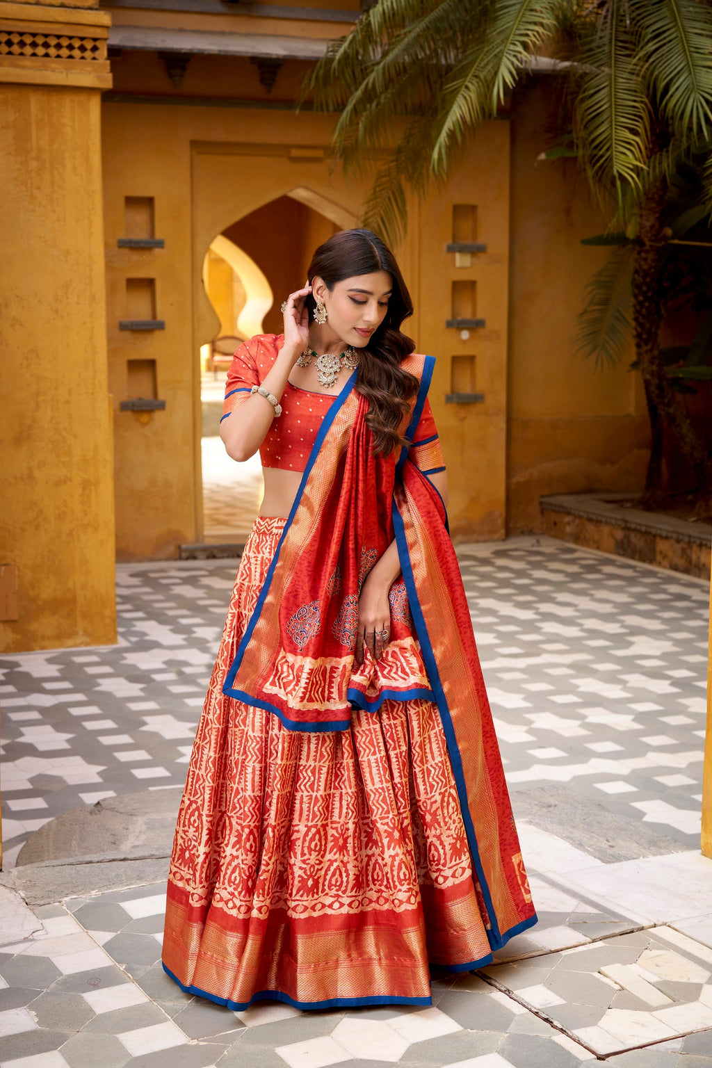 Lorenvalley Fashion Rust Dola Silk Batik Print with Zari Weaving Work Lehenga Choli with Dupatta