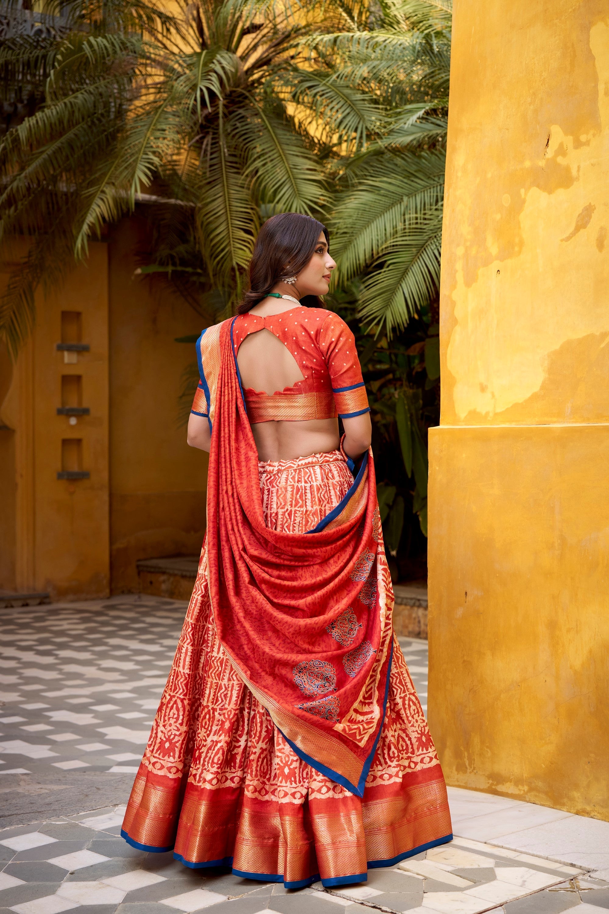 Lorenvalley Fashion Rust Dola Silk Batik Print with Zari Weaving Work Lehenga Choli with Dupatta