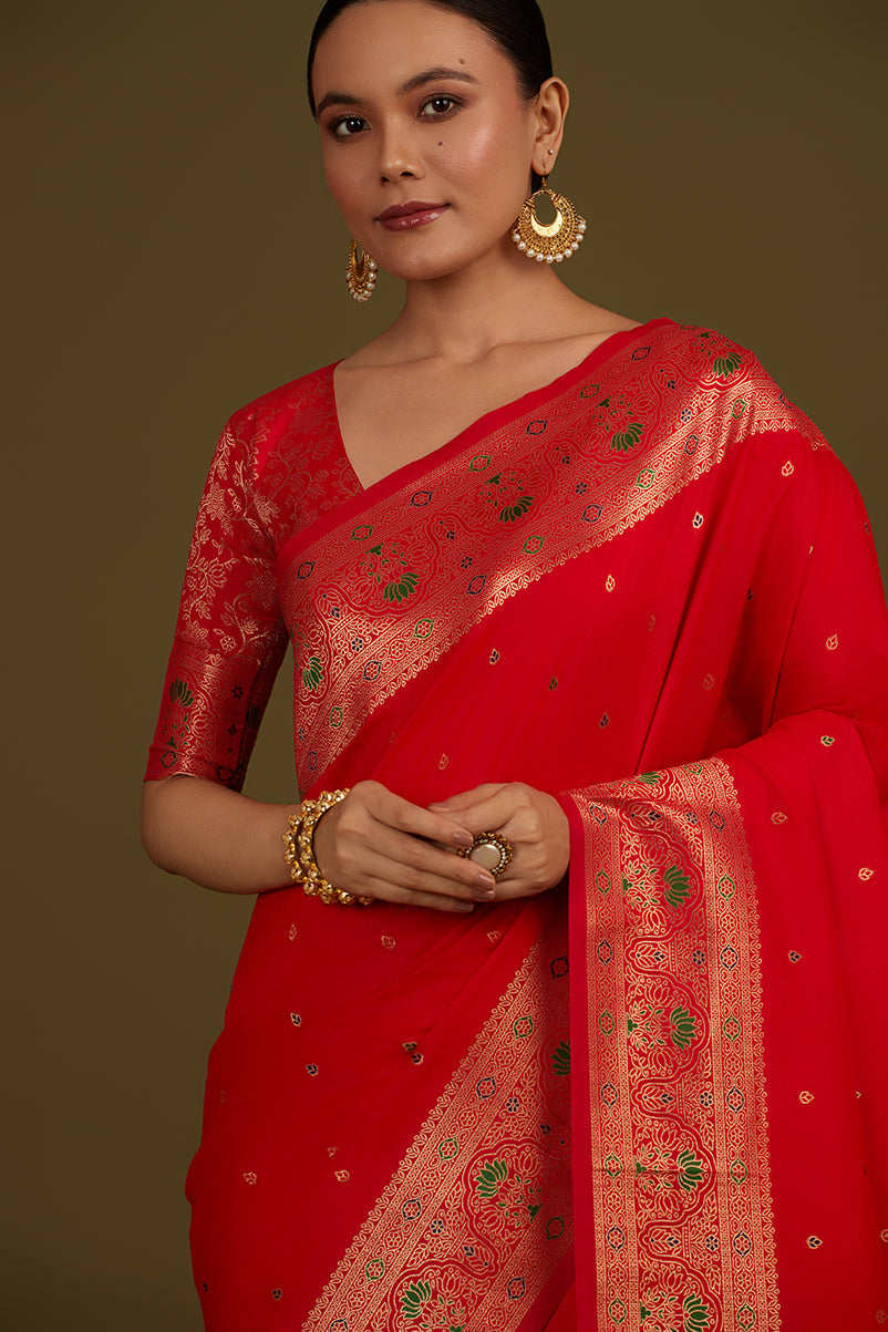 Monjolika Fashion Elegant Red Banarasi Silk Blend SareeBrocade Motifs & Zari Woven Splendor