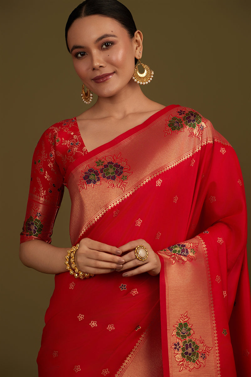 Monjolika Fashion Red Woven Silk Blend SareeWith Zari Work & Floral Motifs