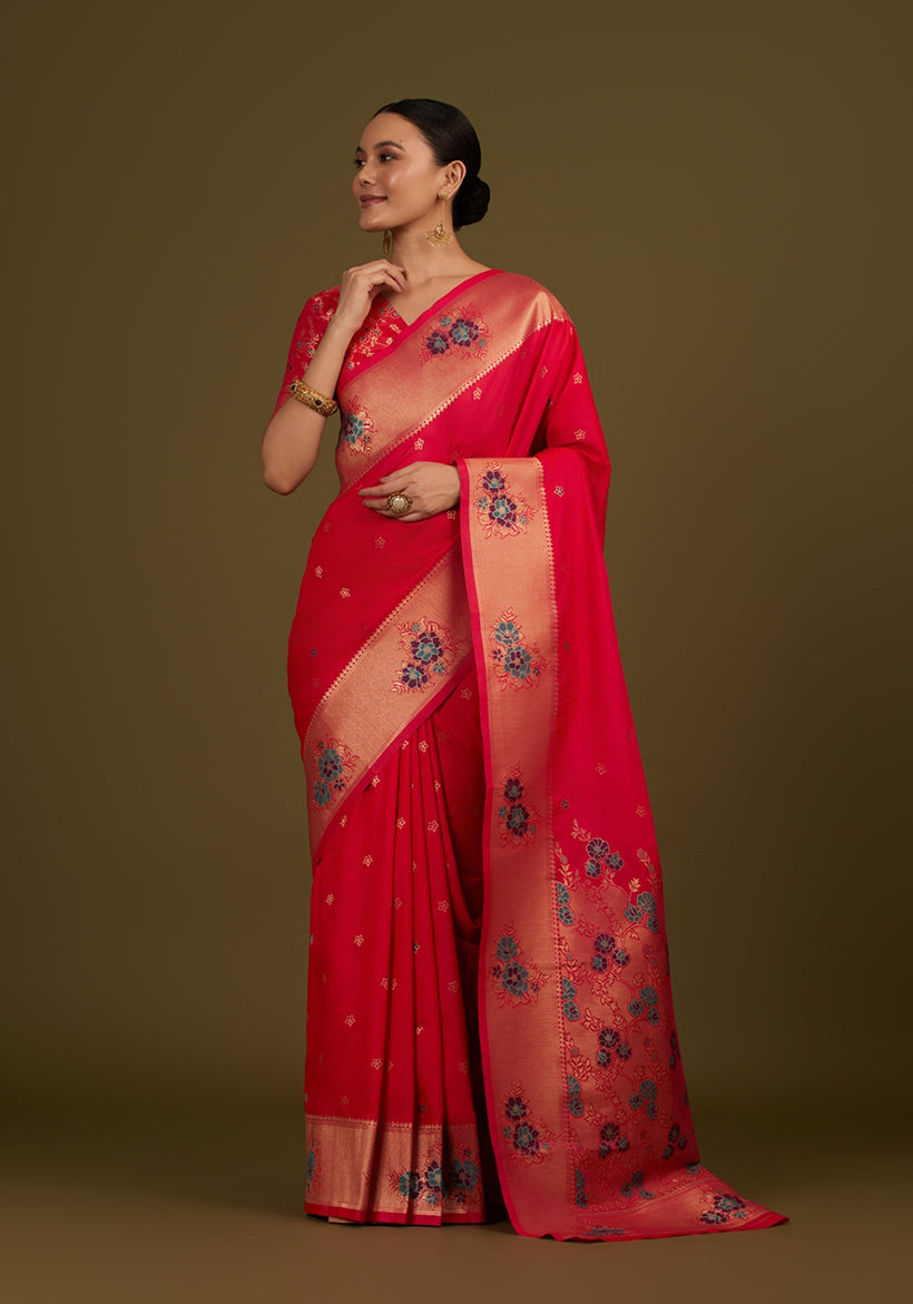 Monjolika Fashion Pink Woven Silk Blend SareeWith Zari Work & Floral Motifs