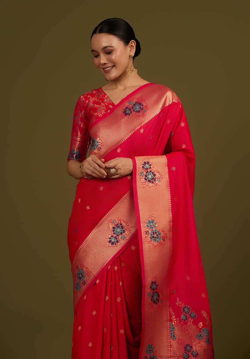 Monjolika Fashion Pink Woven Silk Blend SareeWith Zari Work & Floral Motifs