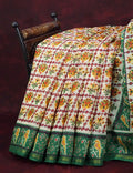 Shades of Off White And Mango Green Colour Patan Patola Semi Chanderi Saree By Gayathri Reddy Designer Studio