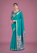 Monjolika Fashion Charming Turquoise Color Silk Golden Zari Woven Ceremony Saree