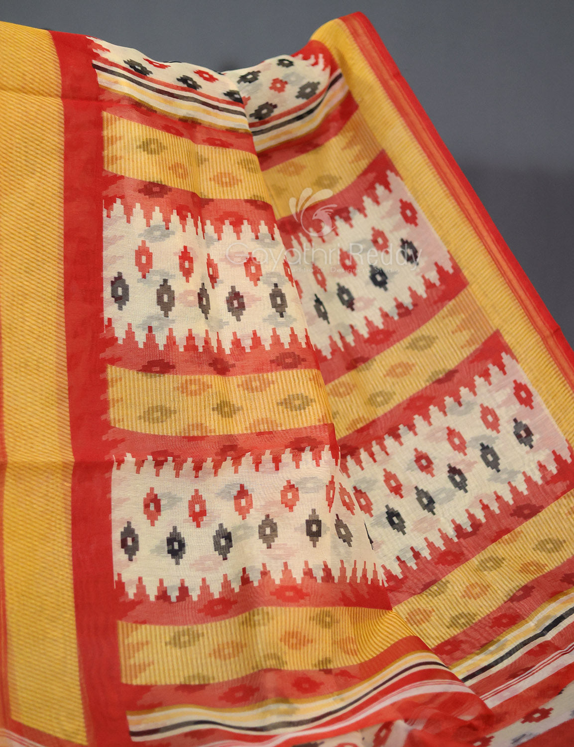 Shades of Cream And Red Colour Blouse Patola Print Semi Chanderi Saree By Gayathri Reddy Designer Studio