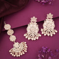 Tehzeeb Creations Fashionable Gold Earrings And Tikka Studded With Kundan And Pearl