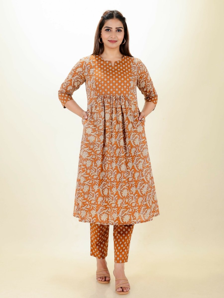 Aramya Orange Soft Cotton Floral Print Panelled Kurta Set for Women