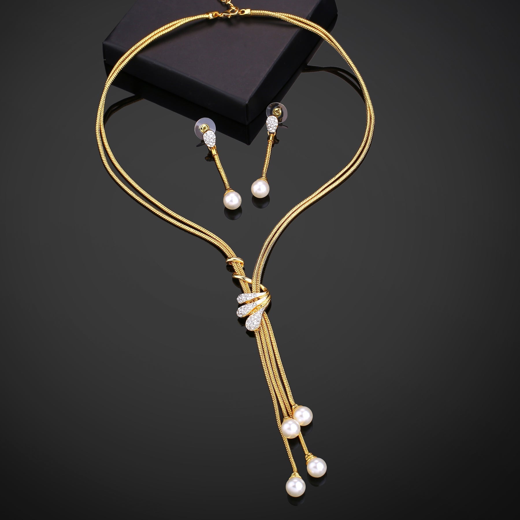 Estele Gold-Polished Trendy Tassel Necklace set with White Pearls for Women