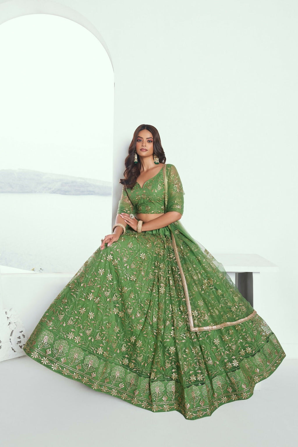 Eilara Elegance Pista Green Net With Embroidered And Thread Zari Sequence Function Wear Lehenga Choli