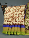 Shades of Cream And Parrot Green Blouse Patola Print Semi Chanderi Saree By Gayathri Reddy Designer Studio