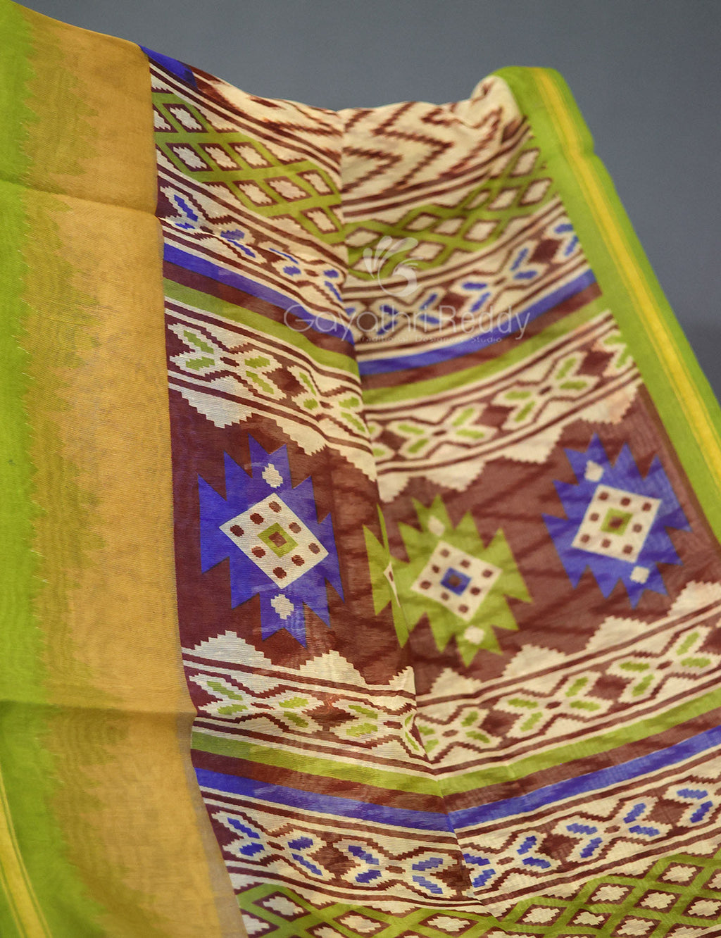 Shades of Cream And Parrot Green Blouse Patola Print Semi Chanderi Saree By Gayathri Reddy Designer Studio