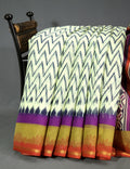 Shades of Cream And Red Blouse Patola Print Semi Chanderi Saree By Gayathri Reddy Designer Studio
