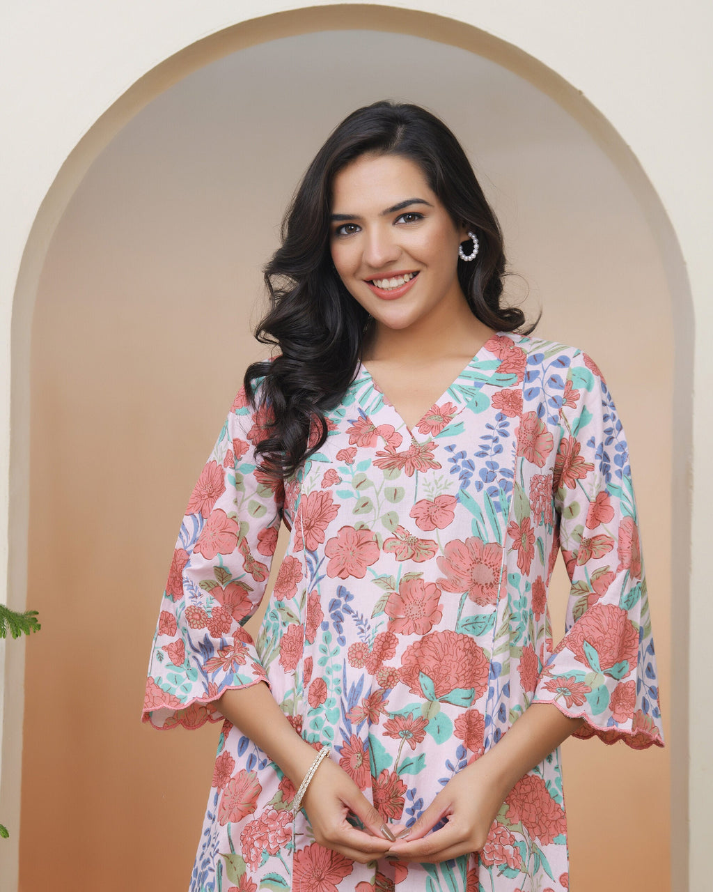 Vaasva Women Peach Floral Cotton Printed Flare Kurti