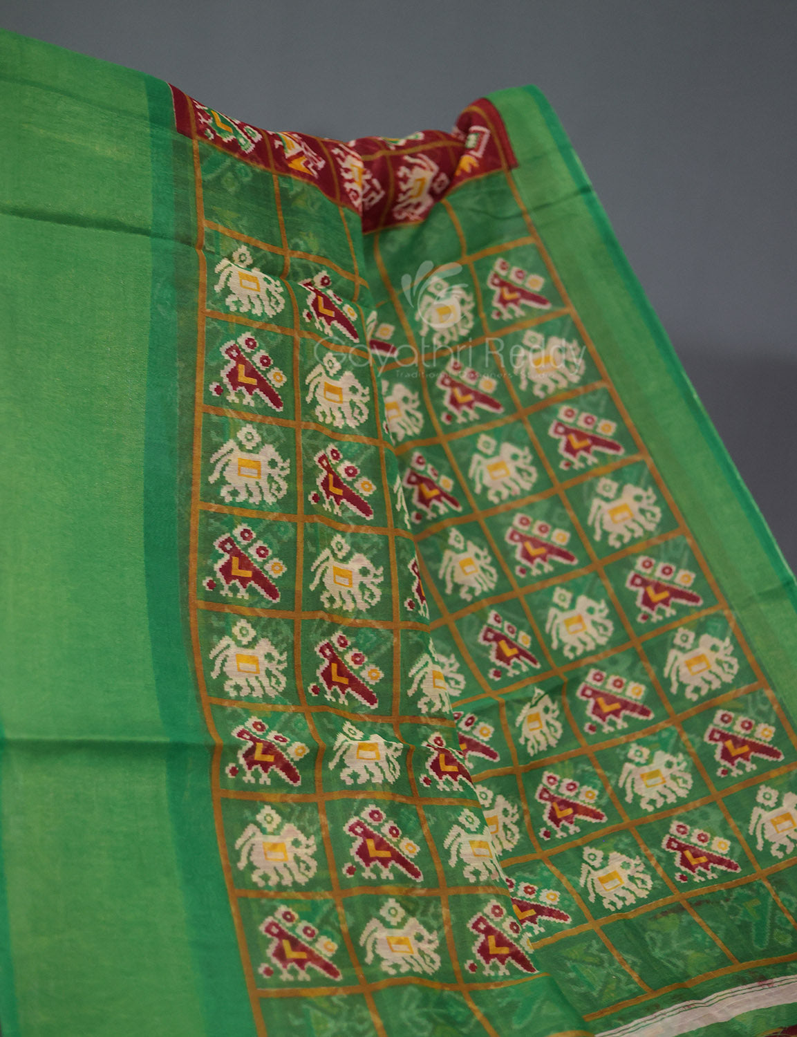 Shades of Maroon And Parrot Green Blouse Patola Print Semi Chanderi Saree By Gayathri Reddy Designer Studio