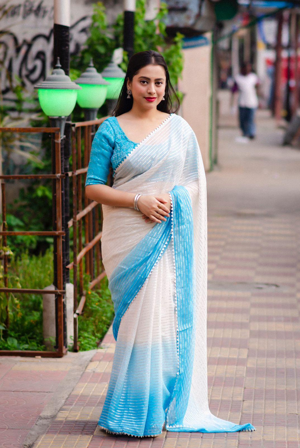 Blue Poly Chiffon Striped Saree with Unstitched Blouse - Hiral Fashion