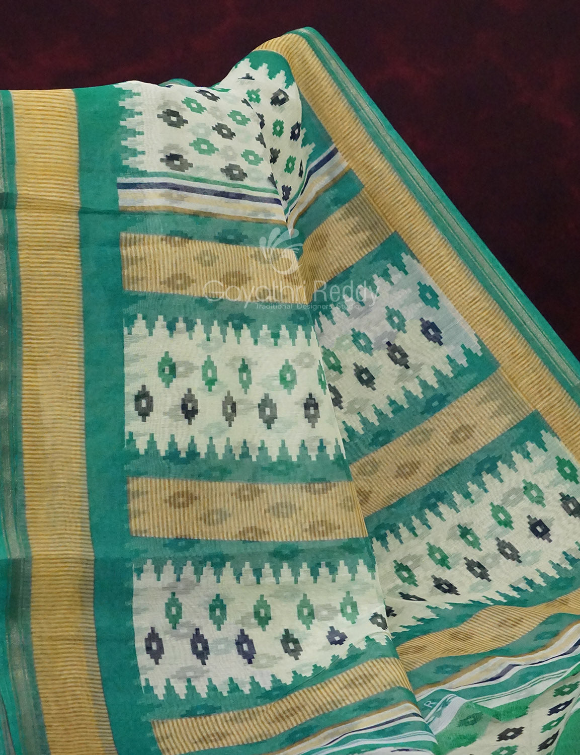 Combo of Off White and Rama Green Patan Patola Semi Chanderi Saree By Gayathri Reddy Designer Studio