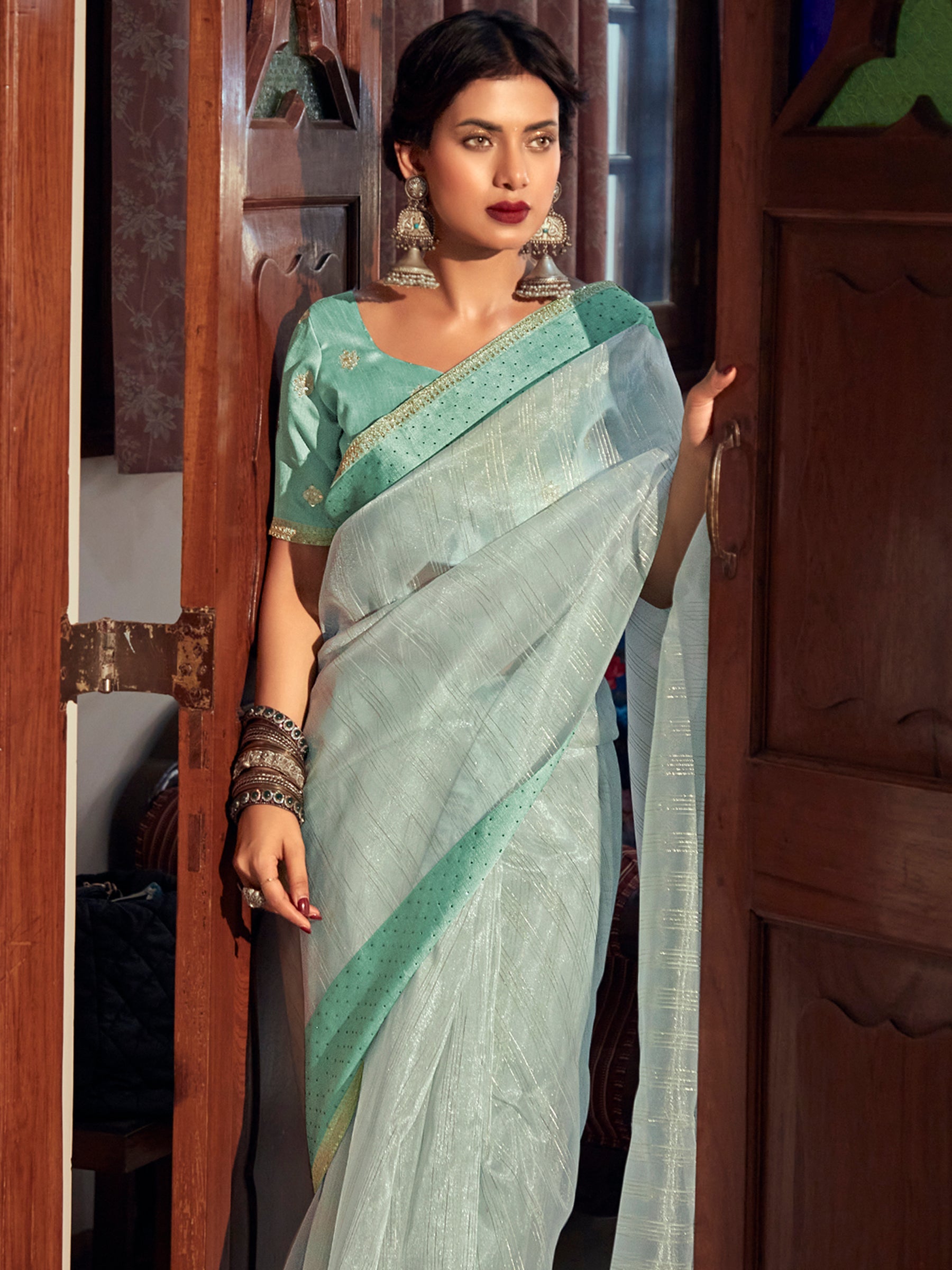Stylee Lifestyle Green Organza Woven Saree