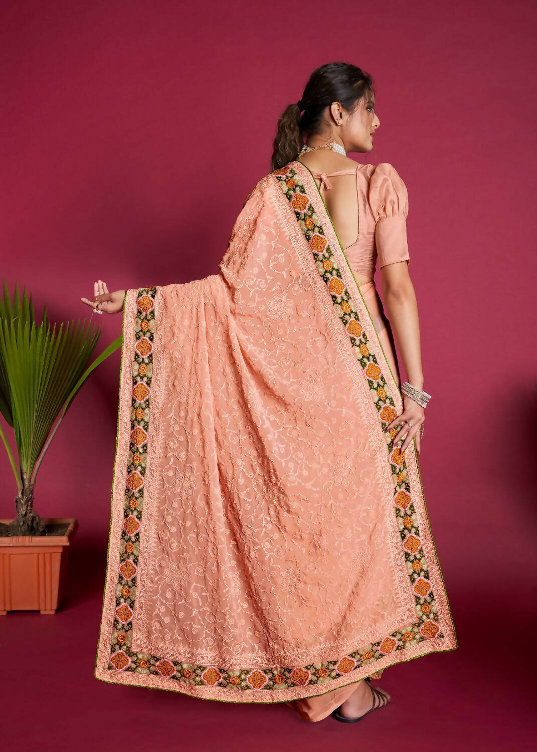 Vamsee Peach Georgette Designer Saree