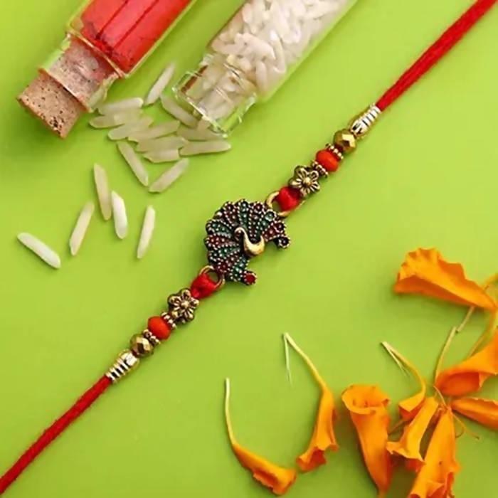 Beautiful Peacock Ethnic Rakhi & Cashew Jar