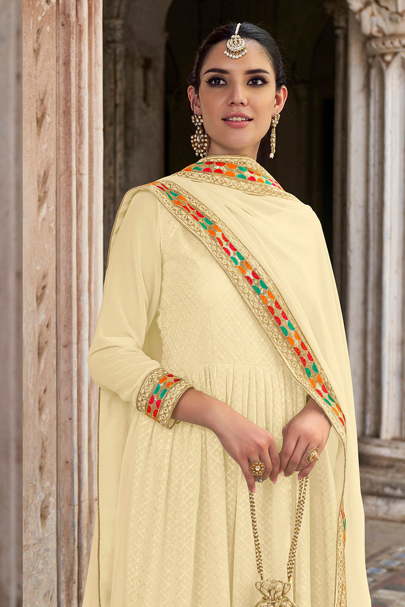 Monjolika Fashion Cream Color Georgette Embroidered Floor Length Anarkali Suit