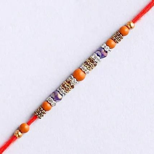 Pearl Sleek Rakhi With Dry Fruits & Besan Laddoos