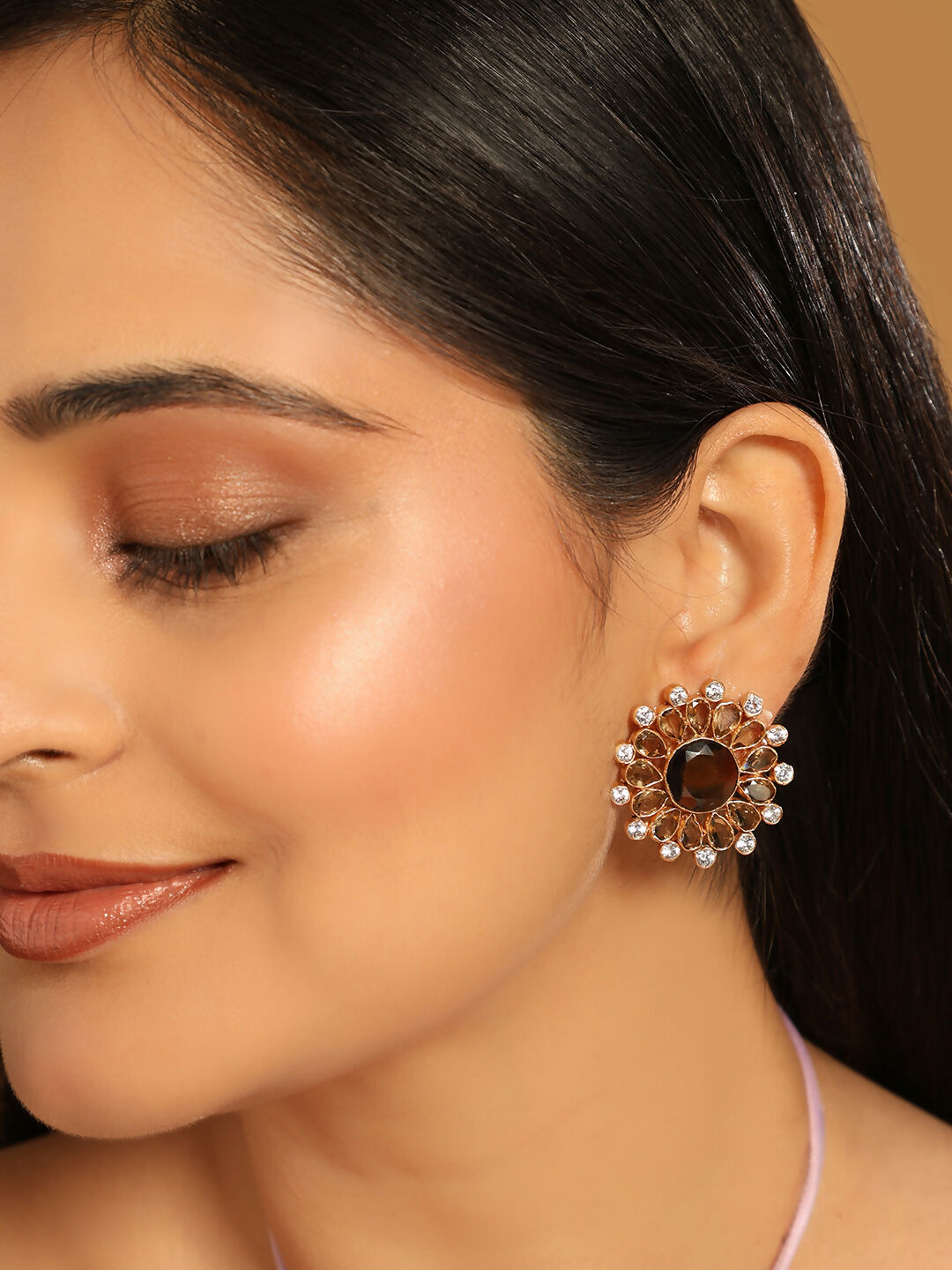 Nuyug 22K Gold Plated Faux Smoky Quartz & White Crystal Studded Contemporary Floral Shaped Studs