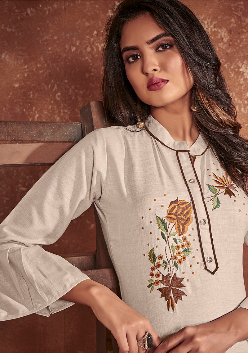 Monjolika Fashion Cotton Embroidered Off White Party Wear Kurti