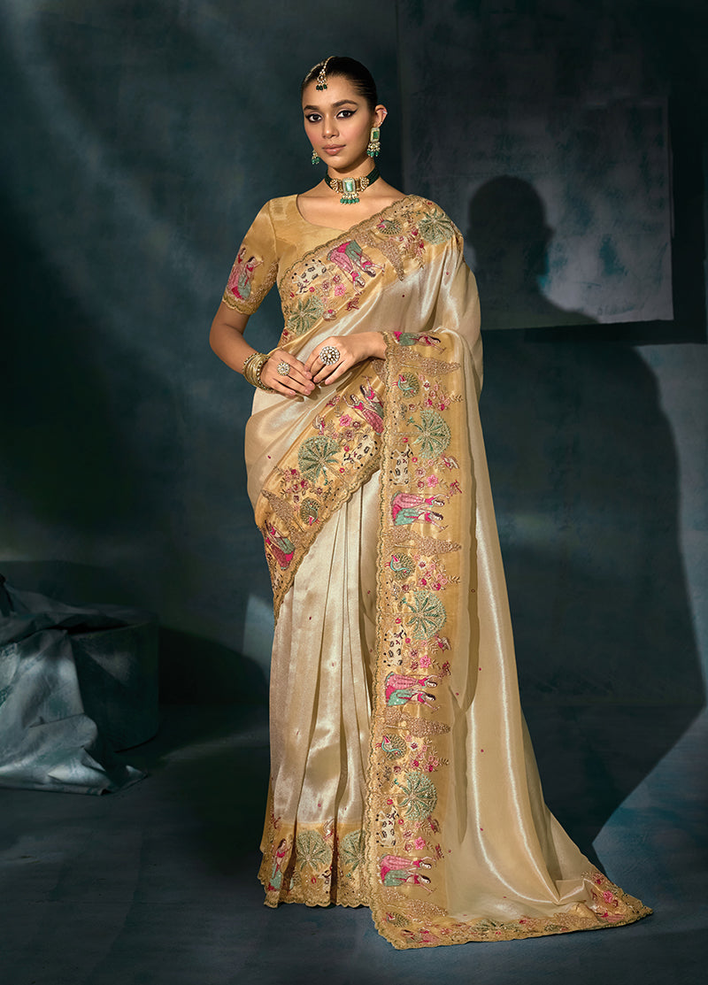 Monjolika Fashion Cream Color Silk Blend Cutdana Moti And Mirror Heavy Work Beautiful Border Saree