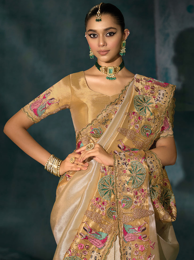 Monjolika Fashion Cream Color Silk Blend Cutdana Moti And Mirror Heavy Work Beautiful Border Saree