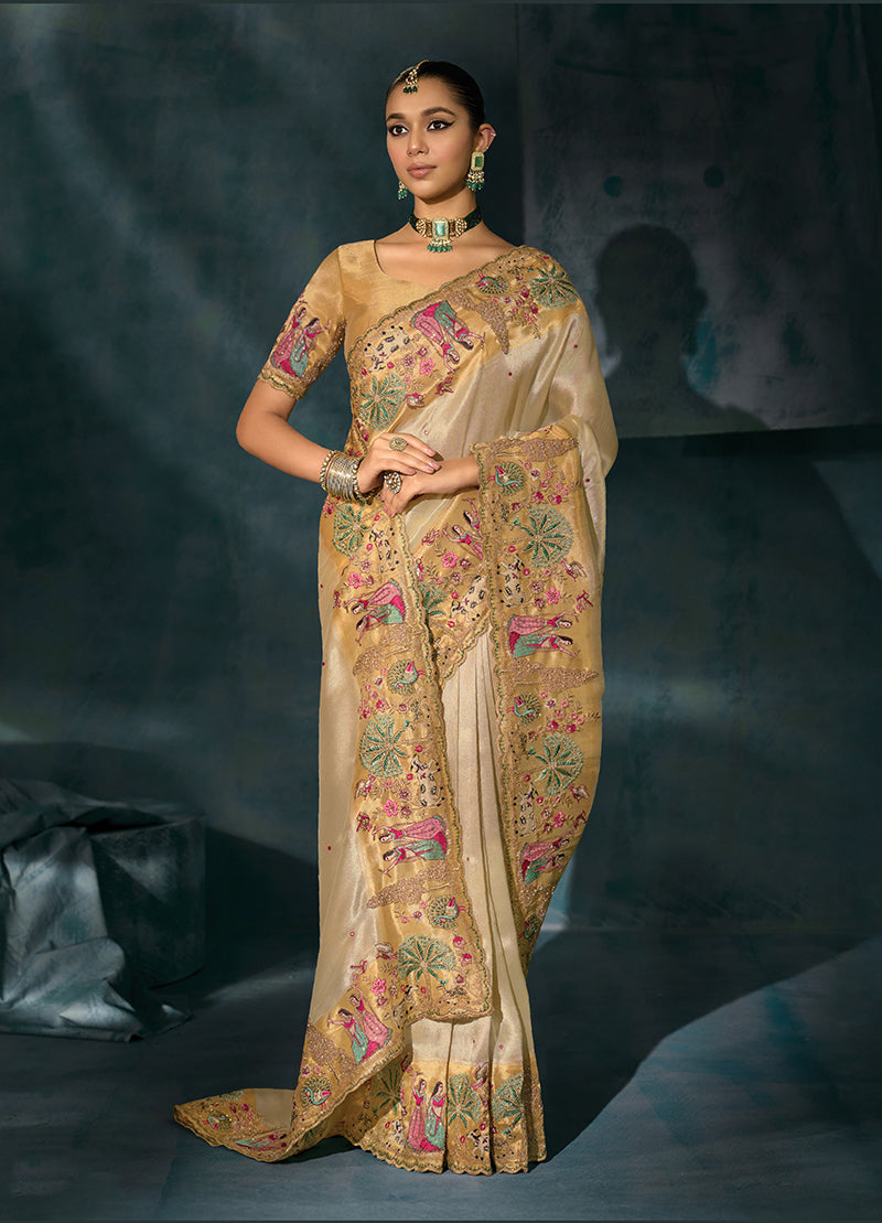 Monjolika Fashion Cream Color Silk Blend Cutdana Moti And Mirror Heavy Work Beautiful Border Saree