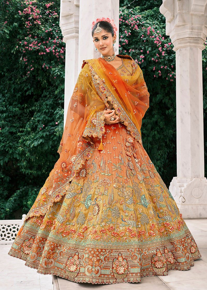 Monjolika Fashion Rust Orange And Mustard Yellow Silk Bridal With Embroidery And Sequins Work Lehenga
