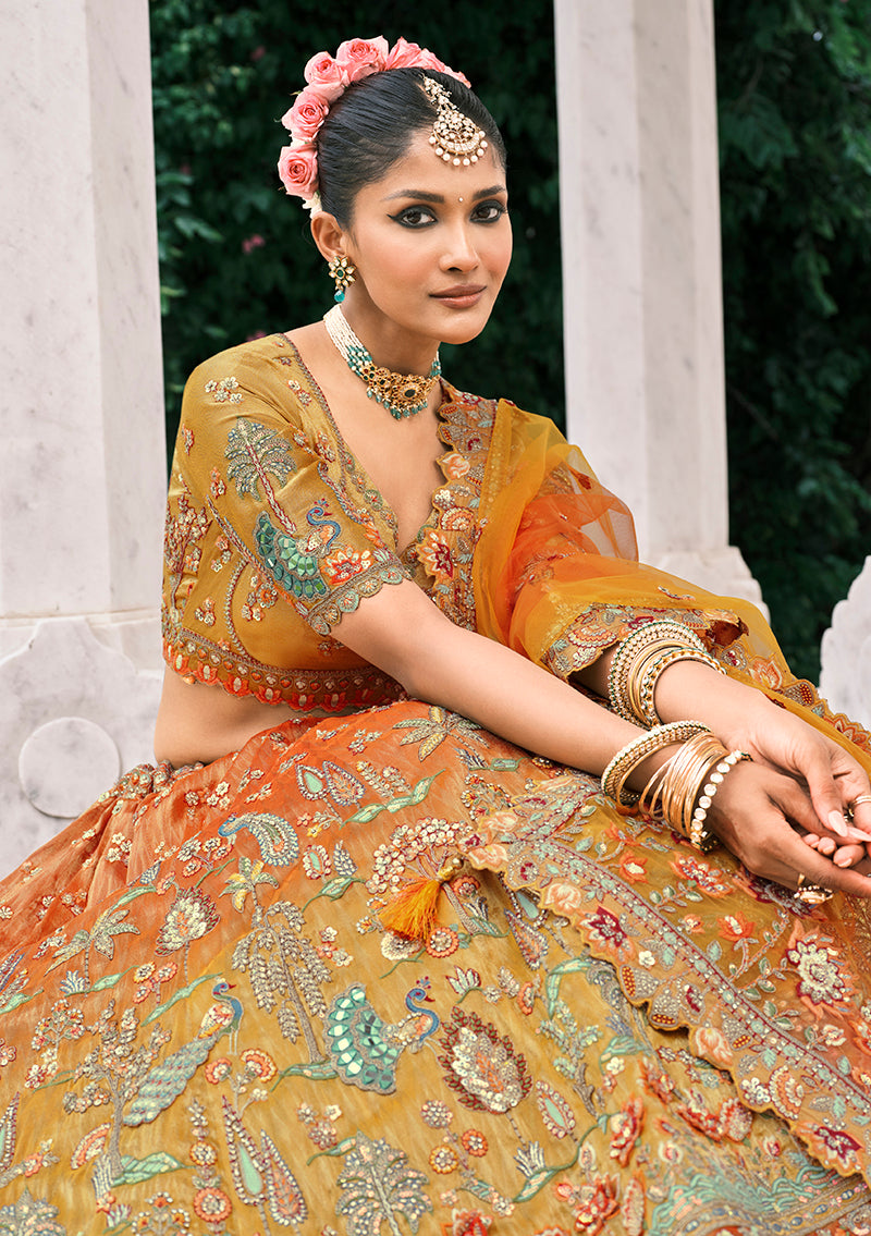 Monjolika Fashion Rust Orange And Mustard Yellow Silk Bridal With Embroidery And Sequins Work Lehenga