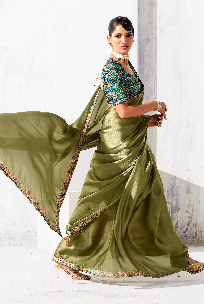 Monjolika Fashion Olive Green Fancy Fabric Embroidered Contemporary Saree
