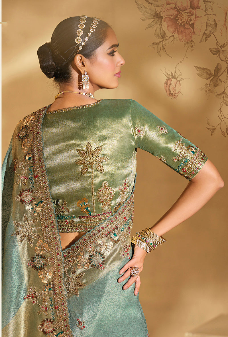 Monjolika Fashion Surpassing Sea Green Embroidery Cut Dana Moti Work Crepe Silk Saree With Heavy Work Blouse Piece