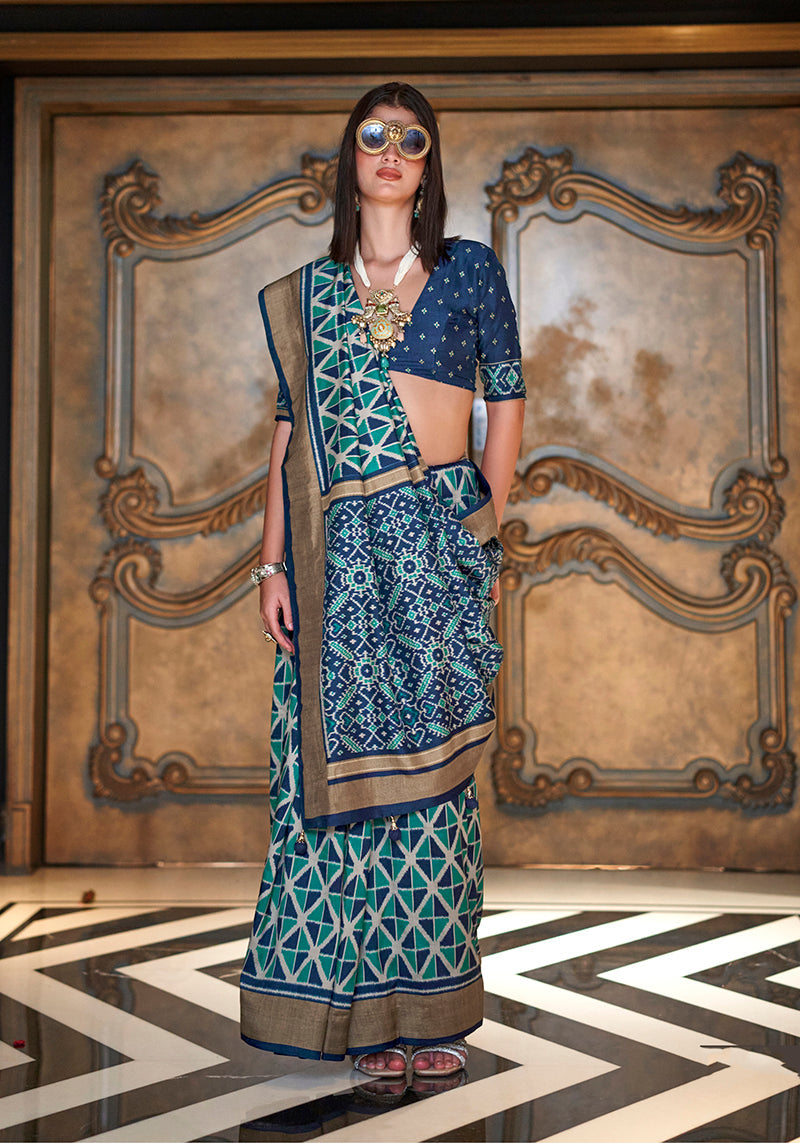 Monjolika Fashion Teal Double Ikkat Silk Blend Foil Printed Saree