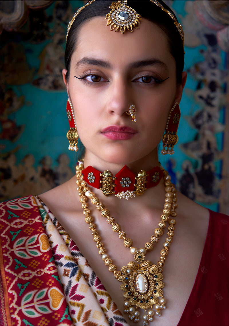 Monjolika Fashion Silk Blend Cream and Red Patola Print Classic Festival Wear Saree