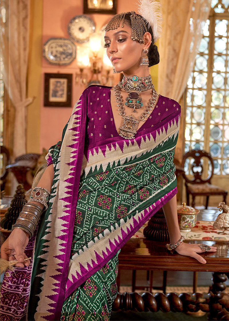 Monjolika Fashion Dark Green & Magenta Patola Design Zari Work Traditional Silk Blend Saree
