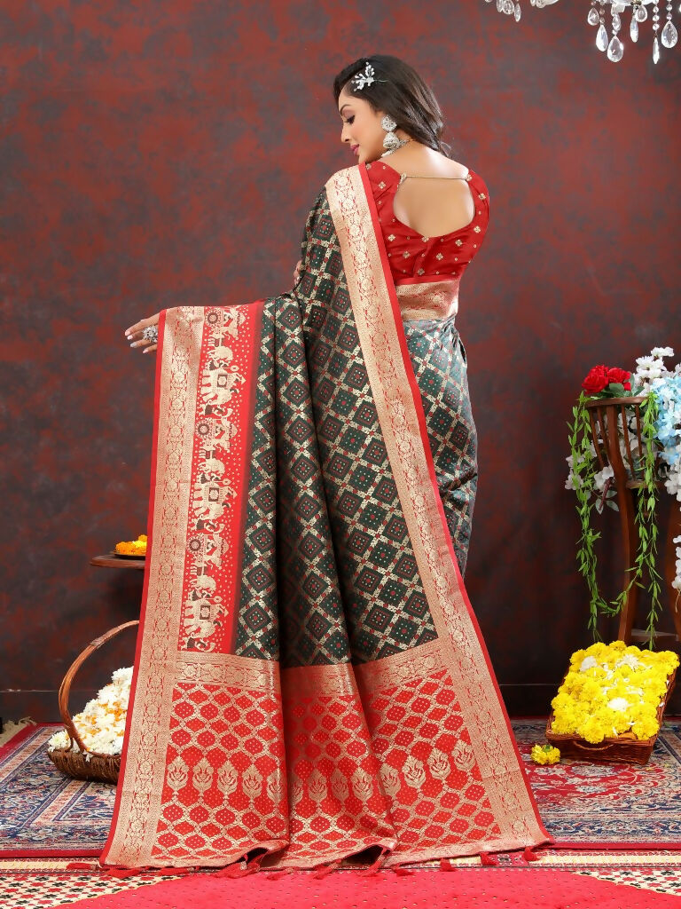 Vastranavya Black Soft Patola Silk With Meenakari Weaving Motifs And Rich Zari Weaving Pallu Saree With Matching Blouse Fabric