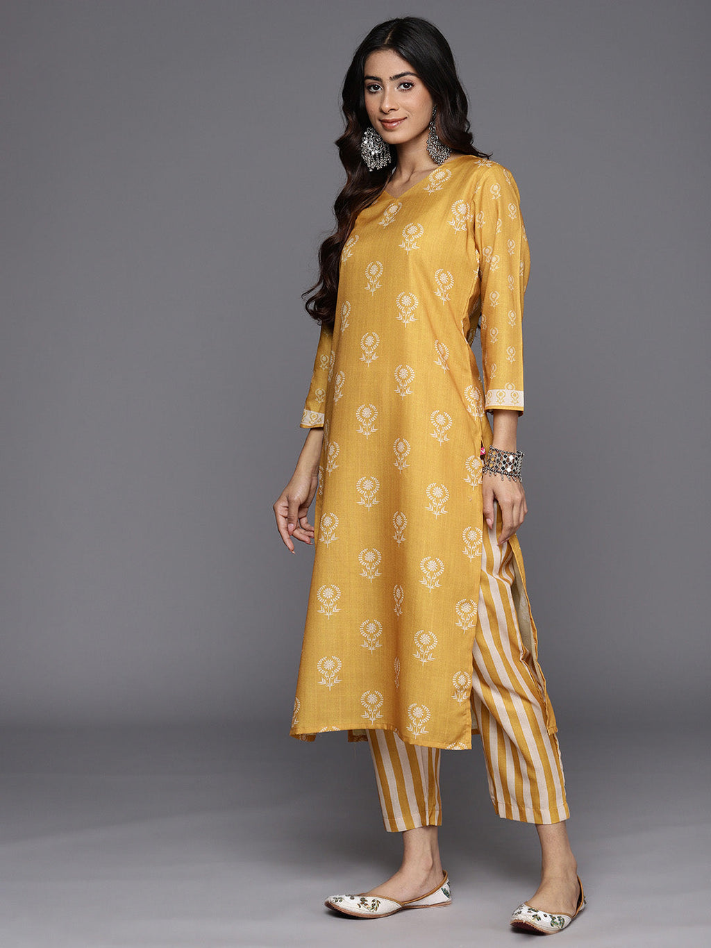 KSUT (House of Varanga) Mustard Digital Printed Kurta With V Neckline Paired With Straight Trouser