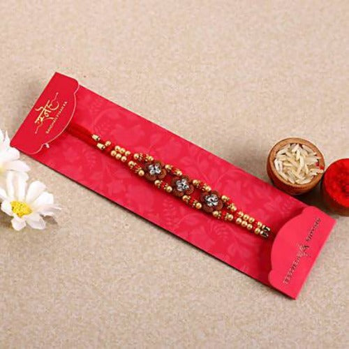 Ethnic American Diamond Rakhi and Fruit N Nut Chocolates Combo