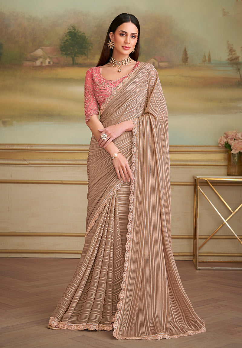 Monjolika Fashion Chiku Gold Satin Georgette Embroidered Border Party Trendy Saree