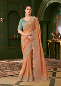 Monjolika Fashion Light Orange Color Georgette Silk Saree With Heavy Work Blouse