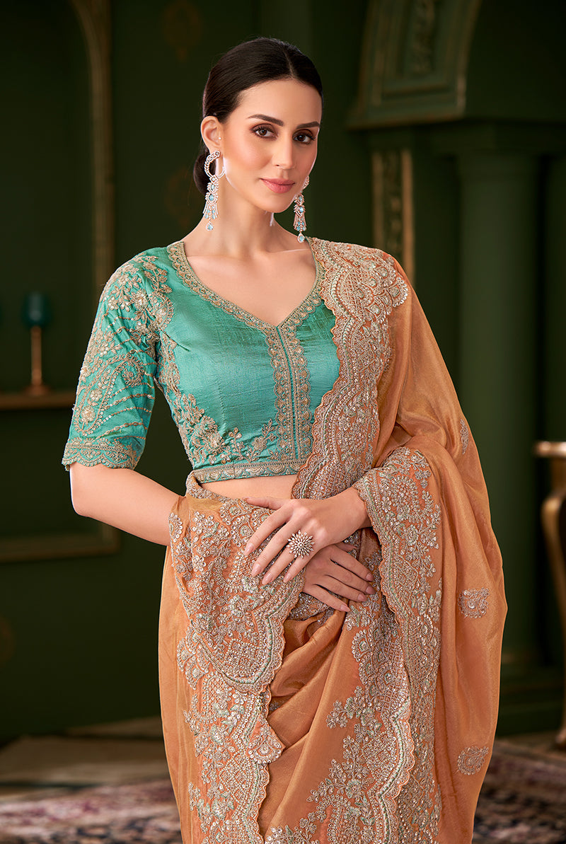 Monjolika Fashion Light Orange Color Georgette Silk Saree With Heavy Work Blouse