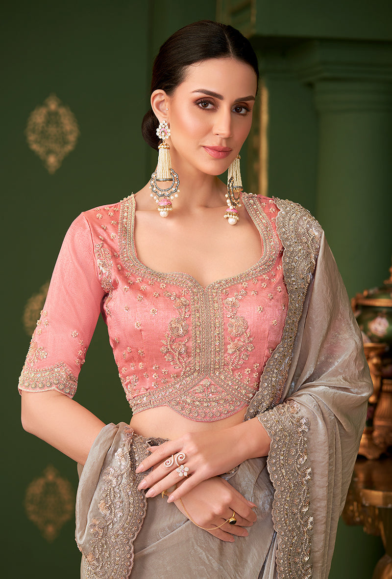 Monjolika Fashion Chiku Color Satin Georgette Saree With Heavy Work Blouse