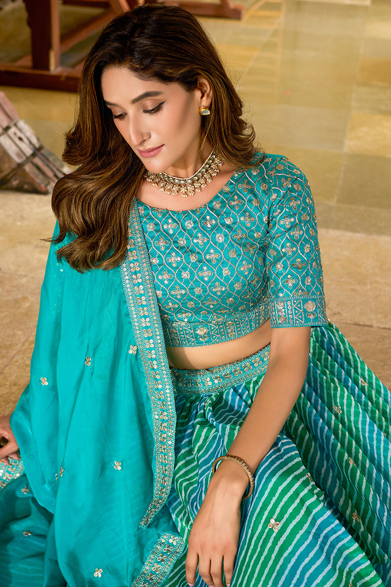 Monjolika Fashion Turquoise Leheriya Print With Embroidered Faux Georgette Lehenga Choli