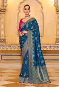 Monjolika Fashion Teal Blue Faux Crepe Silk with beautiful Zari Weaving Work Classic Saree